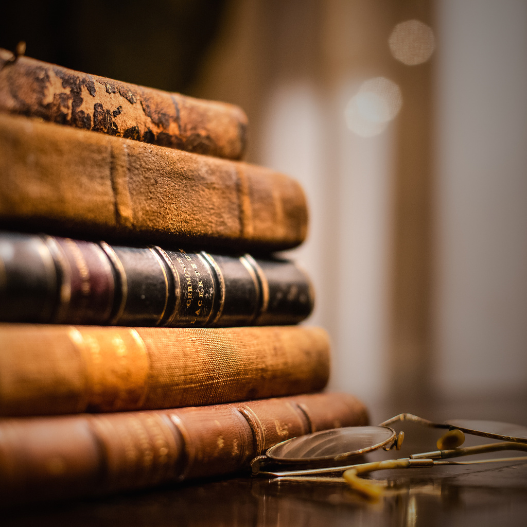 Close up of open books on table